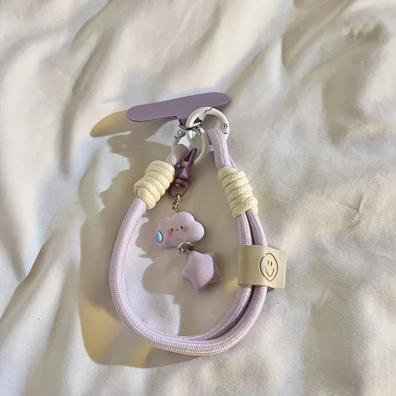 Bunte Handy Handschlaufe mit Stern- und Wolken-Design