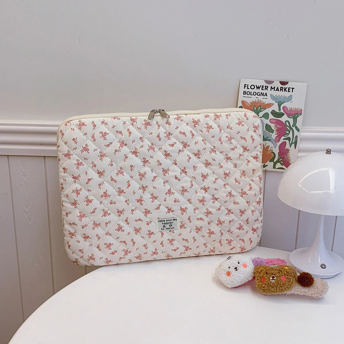 Gesteppte Laptoptasche mit Blumendruck